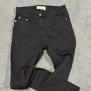 Red bottom black skinny jeans
